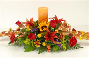 Make their Thanksgiving décor glow with our breathtaking Maple Sugar centerpiece arrangemen