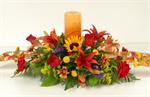 Make their Thanksgiving décor glow with our breathtaking Maple Sugar centerpiece arrangemen
