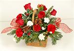 Season Greetings Basket is filled with the colors and scents of the holiday season. Brightly colored red and white carnations with white chrysanthemums, mixed holiday greenery, holiday colored roses, stems of holly, pine cones, colorful ribbons, all arran