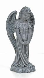 Standing angel holding flowers and measures 23