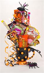 There's no trick in this Halloween treat! Send our sweet and scary candy bouquet. This colorful oversize mug is filled with a mixture of everyone favorite candy. With a friendly, but scary spider standing guard, this halloween treat is sure to bring a smi